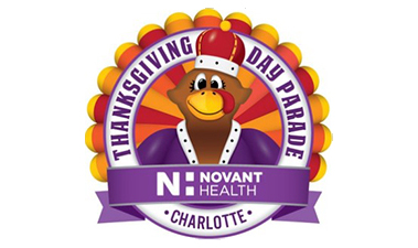 logo for the thanksgiving day parade in charlotte, featuring a cartoon turkey wearing a crown and royal attire. the logo includes the text "thanksgiving day parade" and "novant health charlotte.
