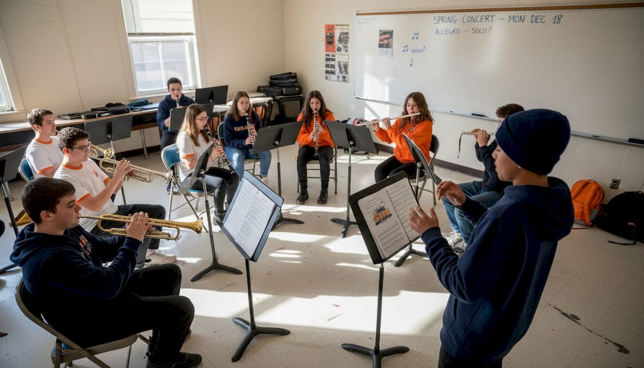 students rehearsing together in band room