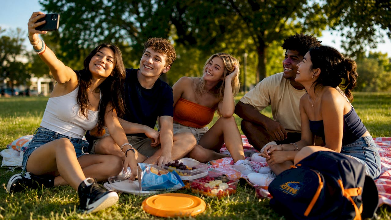 high school students enjoying beach vacation together