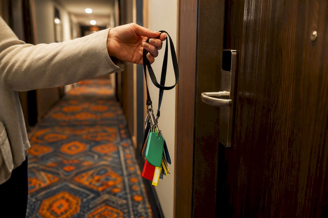 chaperone holding keys for youth group hotel rooms