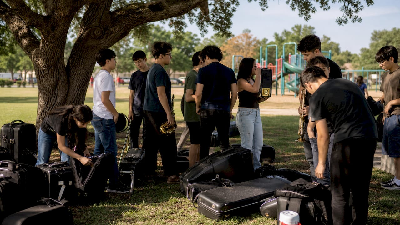 students loading instruments for parade trip