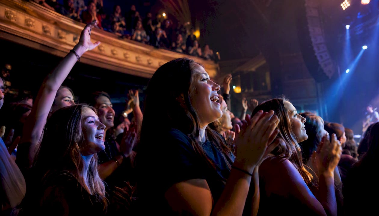students enjoying concert at mid-size chicago venue