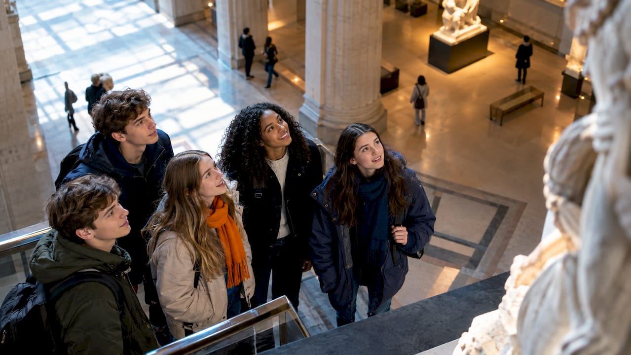 high school students visiting a quiet museum